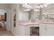 Bathroom with corner vanity and ample storage at 19387 Hidden Oaks Dr, Brooksville, FL 34604