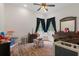 Charming bedroom with wood floors and built in window seat at 19387 Hidden Oaks Dr, Brooksville, FL 34604