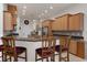 Eat-in kitchen with granite countertops and a breakfast bar at 19387 Hidden Oaks Dr, Brooksville, FL 34604