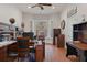 Home office with built-in shelving and hardwood floors at 19387 Hidden Oaks Dr, Brooksville, FL 34604