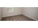 Small bedroom with window and carpet at 2049 Stillview Pass, Zephyrhills, FL 33541