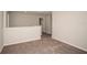 Upstairs hallway with neutral walls and carpet at 2049 Stillview Pass, Zephyrhills, FL 33541