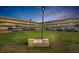 A view of the complex parking lot and lawn with the sign for Royal Chateau 2221 at 2221 Swedish Dr # 11, Clearwater, FL 33763