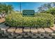 Sign to private golf course nestled within lush landscaping at 2221 Swedish Dr # 11, Clearwater, FL 33763