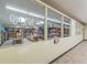 Spacious library featuring well-stocked bookshelves and inviting reading areas at 2221 Swedish Dr # 11, Clearwater, FL 33763