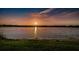 Picturesque sunset over the lake with reflections in rippling water at 2221 Swedish Dr # 11, Clearwater, FL 33763