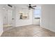 Tile floor dining area with kitchen pass-through at 2333 Feather Sound Dr # A511, Clearwater, FL 33762