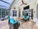 Relaxing patio with seating area and a covered lanai at 2898 Grey Oaks Blvd, Tarpon Springs, FL 34688