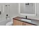 Contemporary bathroom with a bathtub, updated vanity, and stylish fixtures at 3010 W Trilby Ave, Tampa, FL 33611