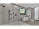 Luxurious bathroom with soaking tub, walk-in shower, and modern fixtures at 3010 W Trilby Ave, Tampa, FL 33611
