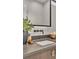 Modern bathroom with dark wood vanity and floating sink at 3010 W Trilby Ave, Tampa, FL 33611