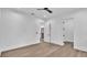 Bright bedroom featuring hardwood floors and ample closet space at 3010 W Trilby Ave, Tampa, FL 33611