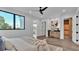 Bright bedroom with ensuite bathroom access and large walk-in closet at 3010 W Trilby Ave, Tampa, FL 33611
