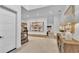 Modern entryway with stairs, featuring contemporary art and a light color scheme at 3010 W Trilby Ave, Tampa, FL 33611