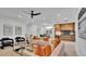 Spacious living area with contemporary furnishings and an open floor plan at 3010 W Trilby Ave, Tampa, FL 33611