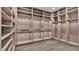Spacious walk-in closet with ample shelving and lighting at 3010 W Trilby Ave, Tampa, FL 33611