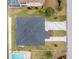 Top-down view of house, landscaping, and driveway at 3431 Palometa Dr, Hernando Beach, FL 34607