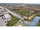 Aerial view of waterfront property with boat storage at 3431 Palometa Dr, Hernando Beach, FL 34607