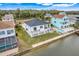 Aerial view of house and canal-side location at 3431 Palometa Dr, Hernando Beach, FL 34607