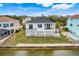 House exterior and backyard, aerial view at 3431 Palometa Dr, Hernando Beach, FL 34607