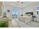 Main bedroom with water views, a king-size bed, and private balcony access at 3431 Palometa Dr, Hernando Beach, FL 34607
