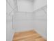 Spacious walk-in closet with wire shelving at 3431 Palometa Dr, Hernando Beach, FL 34607