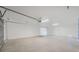 Spacious two-car garage with ample storage space at 3431 Palometa Dr, Hernando Beach, FL 34607