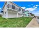 Modern house exterior with water views and landscaping at 3431 Palometa Dr, Hernando Beach, FL 34607