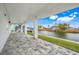 Covered patio overlooking a canal with water views at 3431 Palometa Dr, Hernando Beach, FL 34607