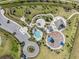 Community pool, playground, and clubhouse with ample parking at 34432 Wynthorne Pl, Wesley Chapel, FL 33545