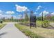 Entrance to dog park with separate areas for small and large dogs at 34432 Wynthorne Pl, Wesley Chapel, FL 33545