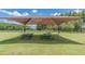 Relaxing picnic area with covered seating at 34432 Wynthorne Pl, Wesley Chapel, FL 33545