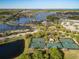 Tennis courts and community center overview at 406 Manns Harbor Dr, Apollo Beach, FL 33572