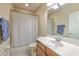Clean bathroom with tub shower combo, vanity, and mirror at 406 Manns Harbor Dr, Apollo Beach, FL 33572