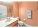 Simple and clean bathroom with single vanity and toilet at 406 Manns Harbor Dr, Apollo Beach, FL 33572