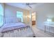 Cozy bedroom with ensuite bathroom and ample closet space at 406 Manns Harbor Dr, Apollo Beach, FL 33572