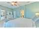 Primary bedroom with ensuite bathroom and neutral decor at 406 Manns Harbor Dr, Apollo Beach, FL 33572