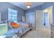 Bright bedroom featuring a double bed and ample closet space at 406 Manns Harbor Dr, Apollo Beach, FL 33572