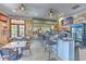Casual community bar with barstools and tables at 406 Manns Harbor Dr, Apollo Beach, FL 33572