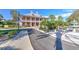 Elegant community clubhouse with palm trees and fountain at 406 Manns Harbor Dr, Apollo Beach, FL 33572