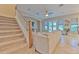 Spacious Gathering room with large sectional sofa and access to pool at 406 Manns Harbor Dr, Apollo Beach, FL 33572