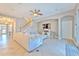 Open-concept Gathering room with sectional sofa and access to kitchen at 406 Manns Harbor Dr, Apollo Beach, FL 33572