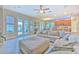 Gathering room features a sectional sofa, pool view, and hardwood floors at 406 Manns Harbor Dr, Apollo Beach, FL 33572