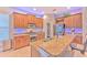 Modern kitchen with granite counters, stainless steel appliances, and ample cabinet space at 406 Manns Harbor Dr, Apollo Beach, FL 33572