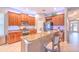 Spacious kitchen with granite countertops, stainless steel appliances, and an island at 406 Manns Harbor Dr, Apollo Beach, FL 33572