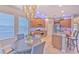 Bright kitchen with an island, wood cabinets, and a chandelier at 406 Manns Harbor Dr, Apollo Beach, FL 33572
