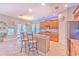 Kitchen features granite countertops, stainless steel appliances, and wood cabinets at 406 Manns Harbor Dr, Apollo Beach, FL 33572