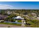 Aerial view of a single-Gathering home with pool, showcasing a large backyard and surrounding neighborhood at 4317 Overlook Ne Dr, St Petersburg, FL 33703