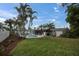 Large backyard with pool and tropical landscaping at 5084 42Nd S St, St Petersburg, FL 33711