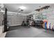 Well-equipped home gym in garage; includes rowing machine, weights, and more at 5084 42Nd S St, St Petersburg, FL 33711